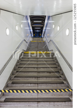 Staircase Leading Down to Subway Station with Safety Markings Staircase Leading Down to Subway Station with Safety Markings 125255905