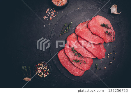 Raw sliced beef or lamb tenderloin meat 125256733