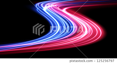 Dynamic, Colorful Light Trails Dancing Against a Deep Black Background Create a Mesmerizing Visual Experience 125256797