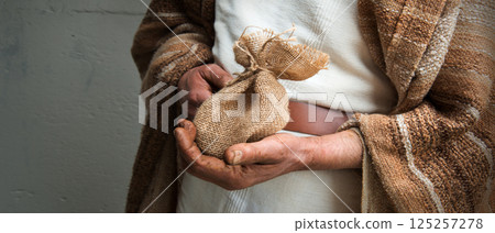 Male hands holding a bag Male hands holding a bag 125257278