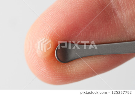 Blister bubble on finger Blister bubble on finger 125257792