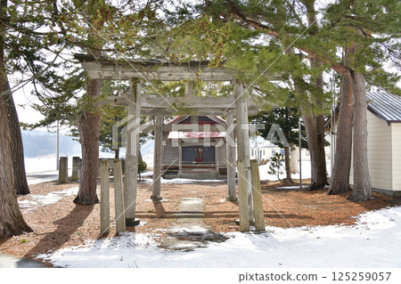 Photographing the grounds of Miyoshi Hachiman Shrine in Hokuto, Hokkaido in early spring Photographing the grounds of Miyoshi Hachiman Shrine in Hokuto, Hokkaido in early spring 125259057