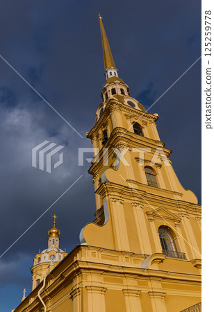 the Peter and Paul Fortress spire at sunset 125259778