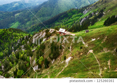 Mountain landscape with shelter house on Golica, Slovenia, at spring, view from above Mountain landscape with shelter house on Golica, Slovenia, at spring, view from above 125260161
