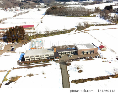 Aerial view of the abandoned Uzura Elementary School building in Atsuta-cho, Hokkaido in early spring Aerial view of the abandoned Uzura Elementary School building in Atsuta-cho, Hokkaido in early spring 125260348