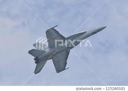 A US Navy F/A-18F Super Hornet performing a demonstration flight at the Iwakuni Air Base Air Show 125260383