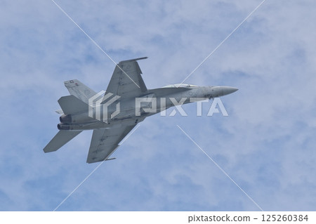 A US Navy F/A-18F Super Hornet performing a demonstration flight at the Iwakuni Air Base Air Show 125260384