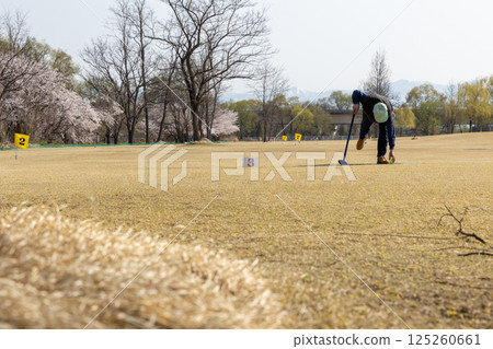 Elderly people playing grand golf Elderly people playing grand golf 125260661