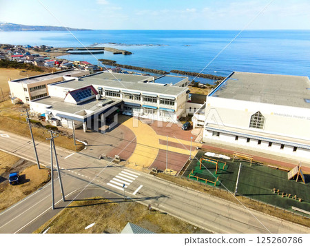 Aerial view of Minamigaoka Elementary School in Esashi, Hokkaido in early spring Aerial view of Minamigaoka Elementary School in Esashi, Hokkaido in early spring 125260786