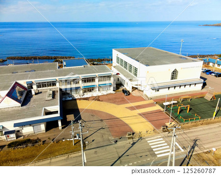 Aerial view of Minamigaoka Elementary School in Esashi, Hokkaido in early spring 125260787
