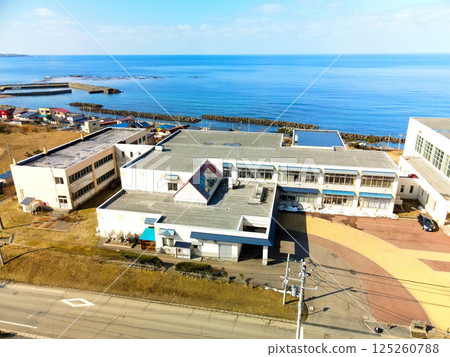 Aerial view of Minamigaoka Elementary School in Esashi, Hokkaido in early spring Aerial view of Minamigaoka Elementary School in Esashi, Hokkaido in early spring 125260788