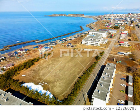 Aerial view of Minamigaoka Elementary School in Esashi, Hokkaido in early spring Aerial view of Minamigaoka Elementary School in Esashi, Hokkaido in early spring 125260795