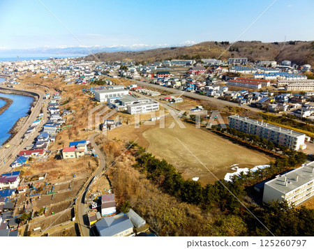 Aerial view of Minamigaoka Elementary School in Esashi, Hokkaido in early spring Aerial view of Minamigaoka Elementary School in Esashi, Hokkaido in early spring 125260797