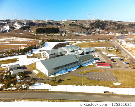 Aerial view of Kaminokuni Junior High School in early spring in Kaminokuni, Hokkaido 125261625