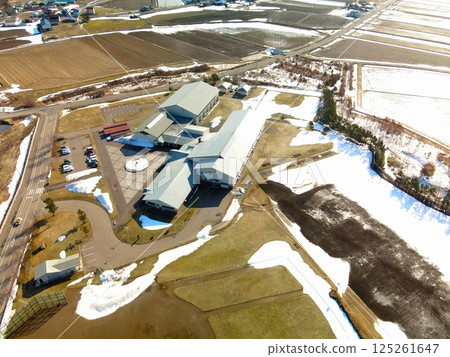 Aerial view of Kaminokuni Junior High School in early spring in Kaminokuni, Hokkaido 125261647