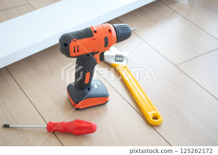 Tools ready for home improvement project in bright indoor setting Tools ready for home improvement project in bright indoor setting 125262172