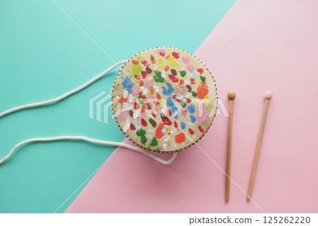 Colorful drum on pastel background highlights creativity 125262220