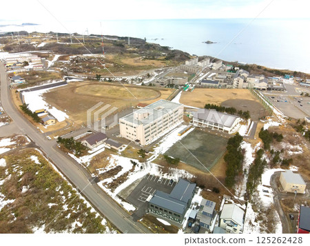 Aerial view of Esashi High School in Esashi Town, Hokkaido in early spring Aerial view of Esashi High School in Esashi Town, Hokkaido in early spring 125262428