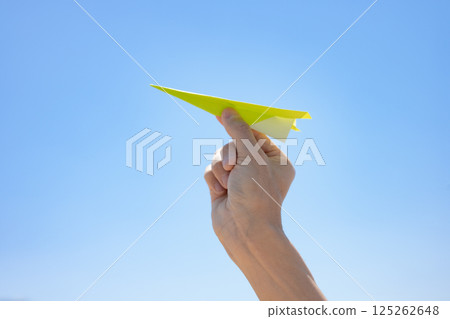 Fly paper airplane Hand 125262648