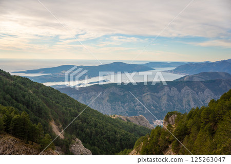 Panoramic view of Kotor Bay Boca and mountains from mountain view point in Montenegro in winter time Panoramic view of Kotor Bay Boca and mountains from mountain view point in Montenegro in winter time 125263047