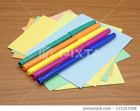Water-based color pen and randomly placed color drawing paper 125263306