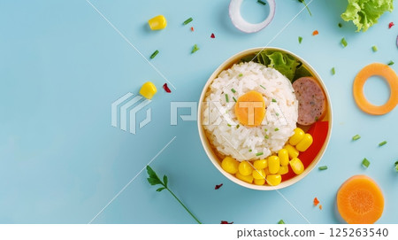 Lunch box rice with carrot, corn, sausage slice for school or work copy space 125263540
