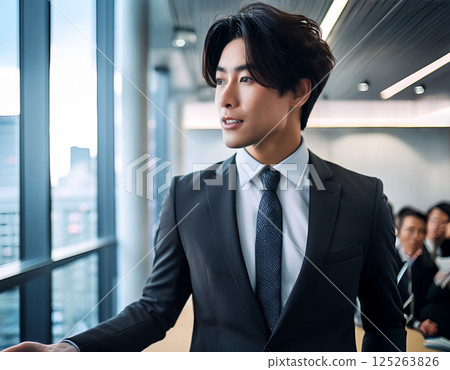 The future lies ahead - Young leaders taking on the challenge of a presentation 125263826