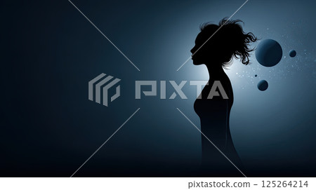 Silhouette of woman with stars and planets in background 125264214