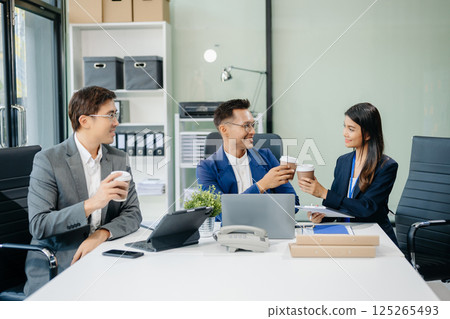 Working Process in Modern Office. Young Woman Account Manager Working at Table with New Business Project. Typing keyboard,Using Contemporary  125265493