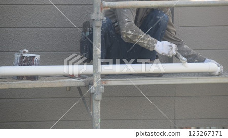 Paint application work, hand painting, brush painting, material, background Paint application work, hand painting, brush painting, material, background 125267371