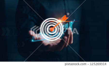 Businessman analyzing 2025 profit growth performance for the 2025-2026 financial plan. Image depicts market concepts, finance trends, revenue graphs, money, and profitability analysis for future Businessman analyzing 2025 profit growth performance for the 2025-2026 financial plan. Image depicts market concepts, finance trends, revenue graphs, money, and profitability analysis for future 125269314