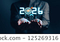 Businessman analyzing 2025 profit growth performance for the 2025-2026 financial plan. Image depicts market concepts, finance trends, revenue graphs, money, and profitability analysis for future 125269316