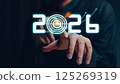 Businessman analyzing 2025 profit growth performance for the 2025-2026 financial plan. Image depicts market concepts, finance trends, revenue graphs, money, and profitability analysis for future 125269319