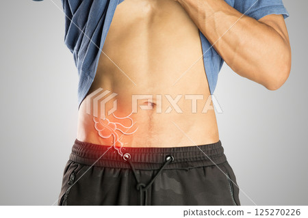 Man shows Appendicitis Symptoms. 125270226