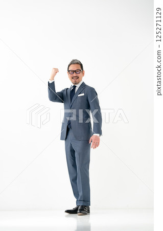 Men in suits, business, fist pump 125271129