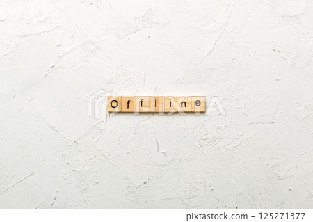 offline word written on wood block. offline text on table, concept offline word written on wood block. offline text on table, concept 125271377