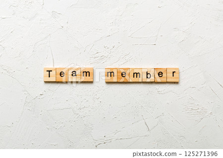 Team member word written on wood block. Team member text on table, concept Team member word written on wood block. Team member text on table, concept 125271396