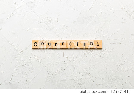 counseling word written on wood block. counseling text on table, concept 125271413