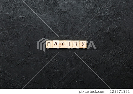 family word written on wood block. family text on table, concept 125271551