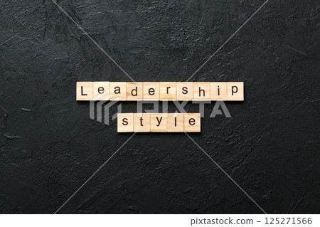 LEADERSHIP STYLE word written on wood block. LEADERSHIP STYLE text on cement table for your desing, concept 125271566