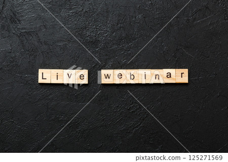 live webinar word written on wood block. live webinar text on cement table for your desing, concept live webinar word written on wood block. live webinar text on cement table for your desing, concept 125271569