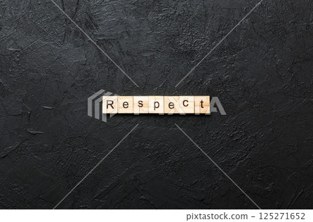 respect word written on wood block. respect text on table, concept respect word written on wood block. respect text on table, concept 125271652