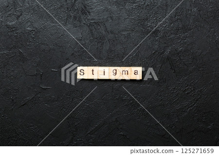 stigma word written on wood block. stigma text on table, concept stigma word written on wood block. stigma text on table, concept 125271659