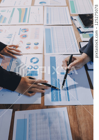 Business analyze,Close up Business people meeting to discuss the situation on the market. Business Financial Concept Business analyze,Close up Business people meeting to discuss the situation on the market. Business Financial Concept 125275078