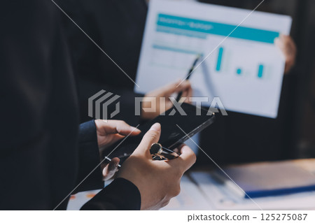 Business analyze,Close up Business people meeting to discuss the situation on the market. Business Financial Concept Business analyze,Close up Business people meeting to discuss the situation on the market. Business Financial Concept 125275087