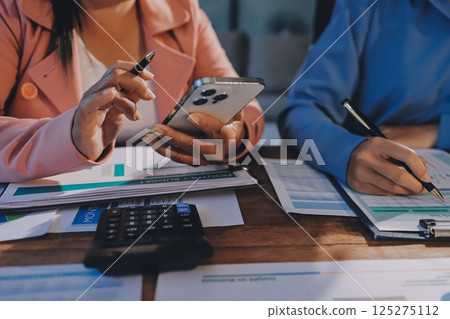 Business analyze,Close up Business people meeting to discuss the situation on the market. Business Financial Concept Business analyze,Close up Business people meeting to discuss the situation on the market. Business Financial Concept 125275112