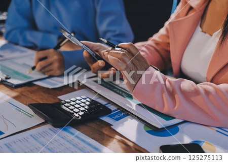 Business analyze,Close up Business people meeting to discuss the situation on the market. Business Financial Concept Business analyze,Close up Business people meeting to discuss the situation on the market. Business Financial Concept 125275113
