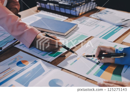 Business analyze,Close up Business people meeting to discuss the situation on the market. Business Financial Concept Business analyze,Close up Business people meeting to discuss the situation on the market. Business Financial Concept 125275143