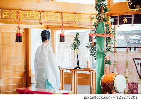 Praying at the shrine 125275201