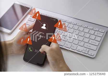 Warning against phone scams, It highlights the need to be wary of unknown callers and suspicious messages. Emergency warning alert alarm on Smartphone, Technological vulnerability. 125275640